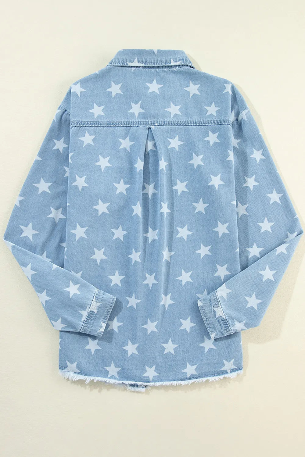 Raw hem star-embellished denim top with a collared neck by Trendsi, featuring a casual, stylish design and medium wash denim fabric.