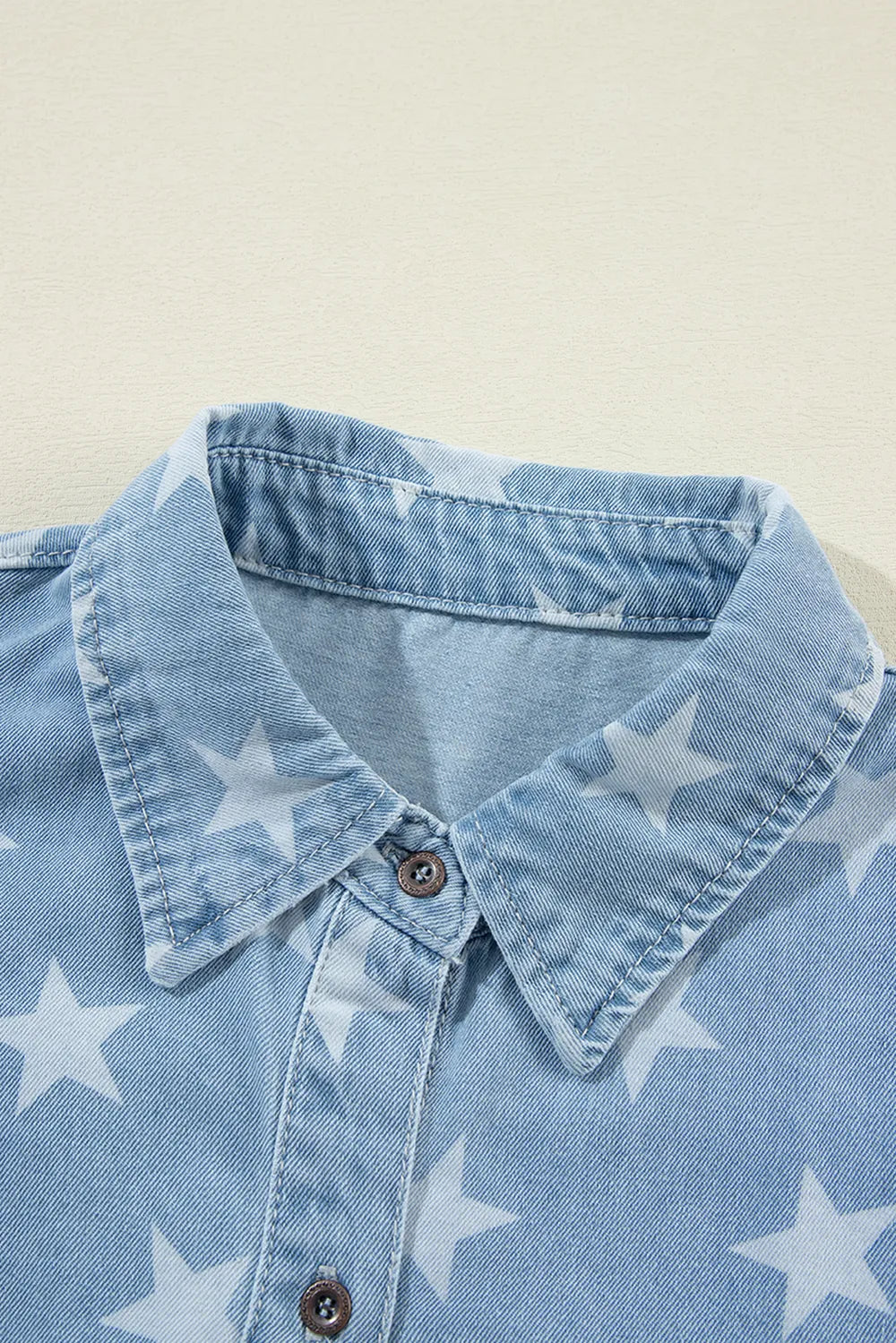 Raw hem star-embellished denim top with a collared neckline from Trendsi, featuring a casual, stylish design.