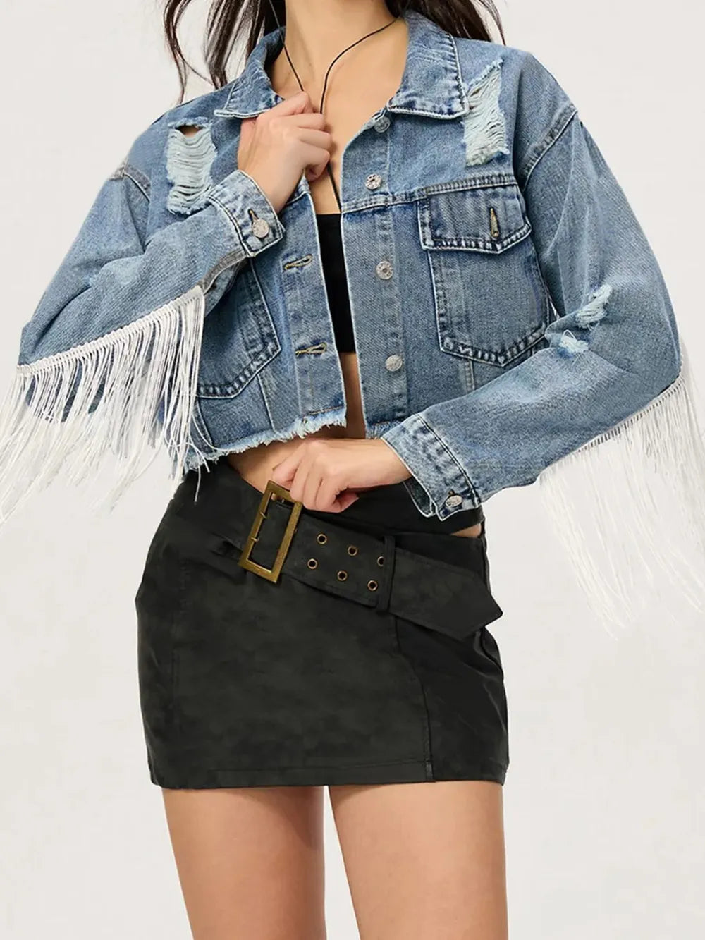 Medium-sized distressed denim cropped top with fringe and collared neck by Trendsi, showcasing a casual, stylish design.