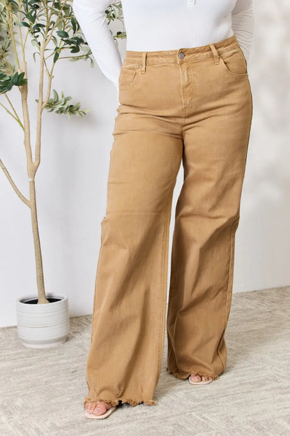 Risen full size wide-leg jeans with fringe hem, featuring a relaxed fit and trendy style, shown in the product image.