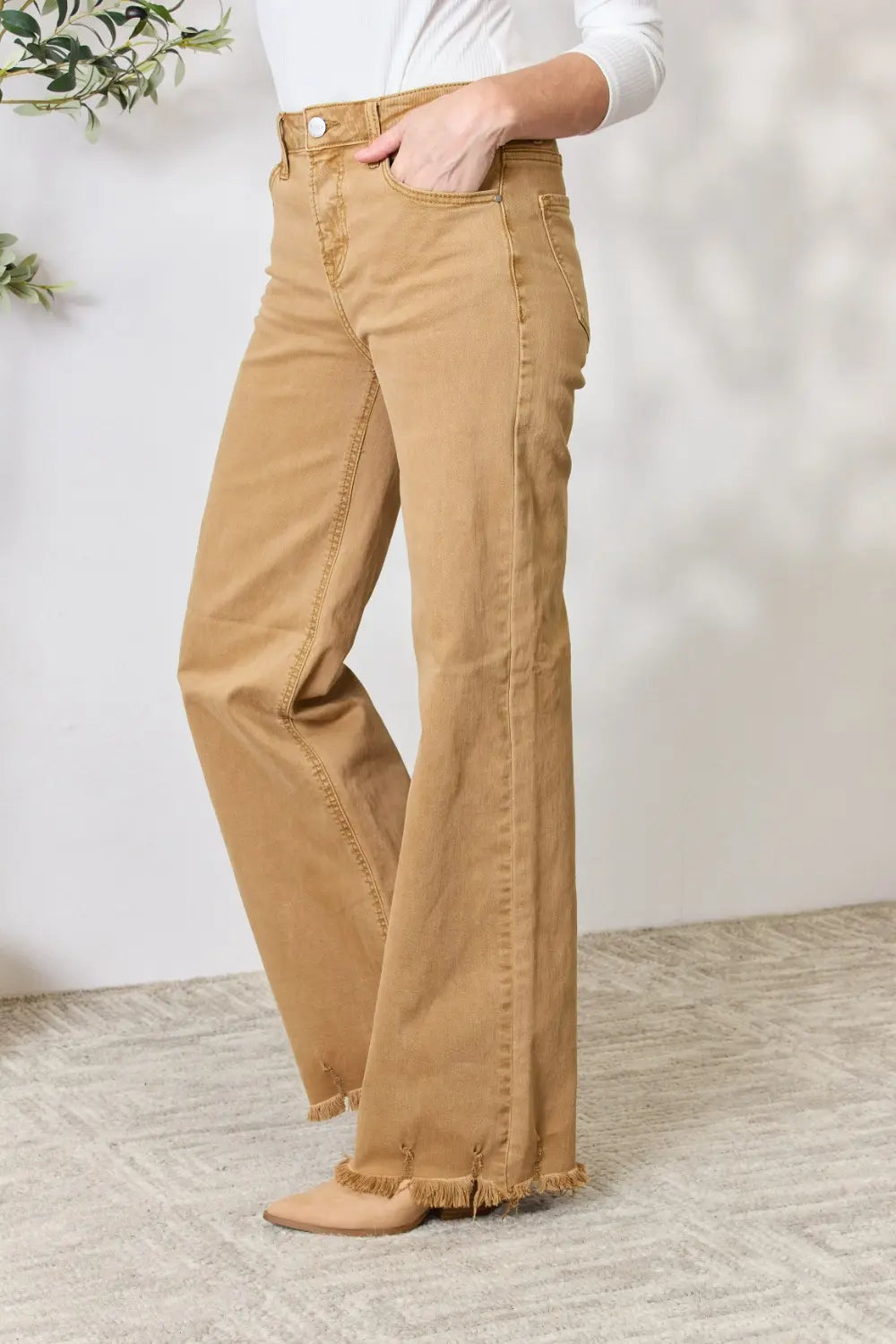 Risen full size fringe hem wide-leg jeans from Trendsi, featuring a relaxed fit and distressed detailing.