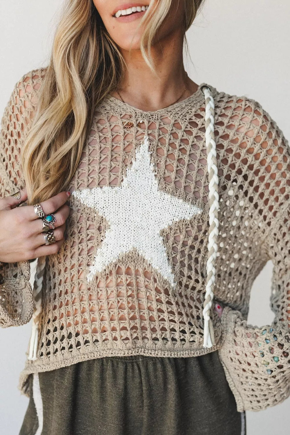 Mocha star pattern crochet hooded drawstring knit cover-up with long sleeves and relaxed fit, perfect for casual beachwear.