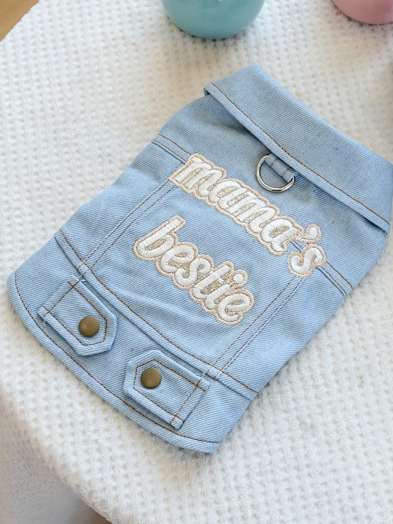 Tiny embroidered denim pet jacket with floral details, designed for small dogs, featuring trendy Trendsi branding.
