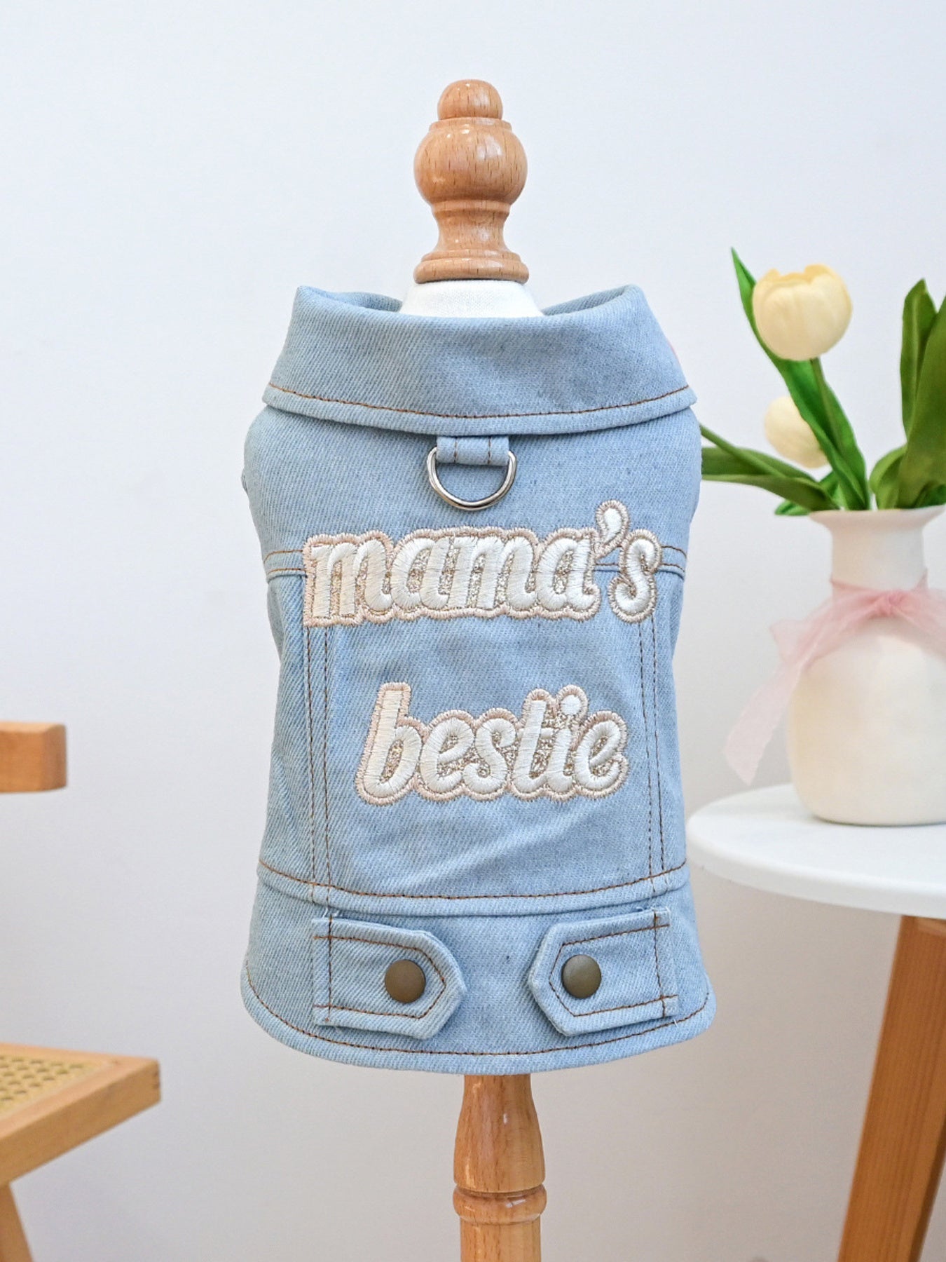 Small embroidered denim pet jacket by Trendsi featuring colorful stitching and a stylish design for pets.