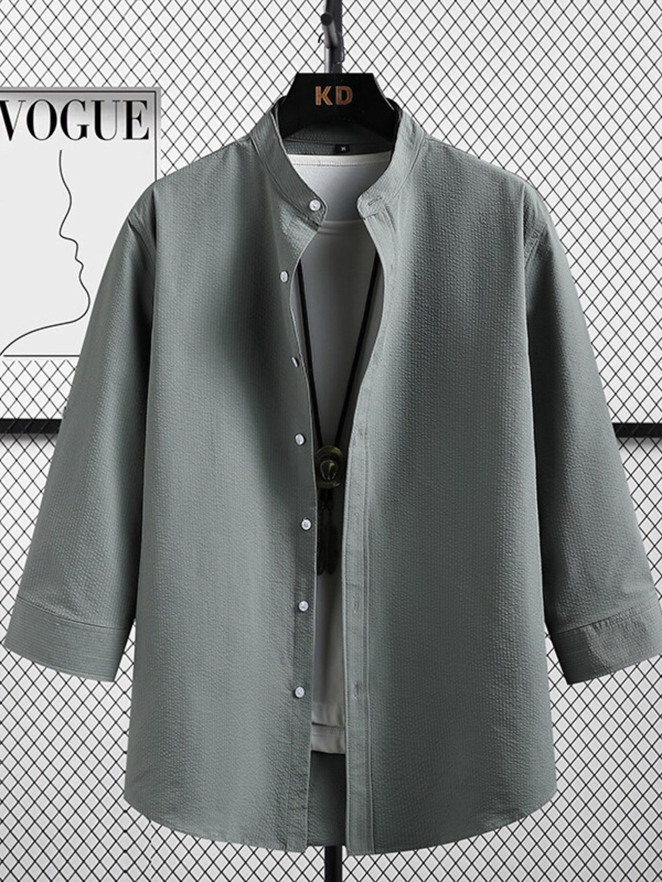 Men's plus size casual button-up shirt with three-quarter sleeves, in a comfortable, relaxed fit from Trendsi.