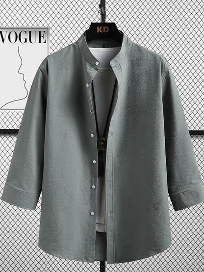 Men's plus size casual button-up shirt with three-quarter sleeves, in a comfortable, relaxed fit from Trendsi.