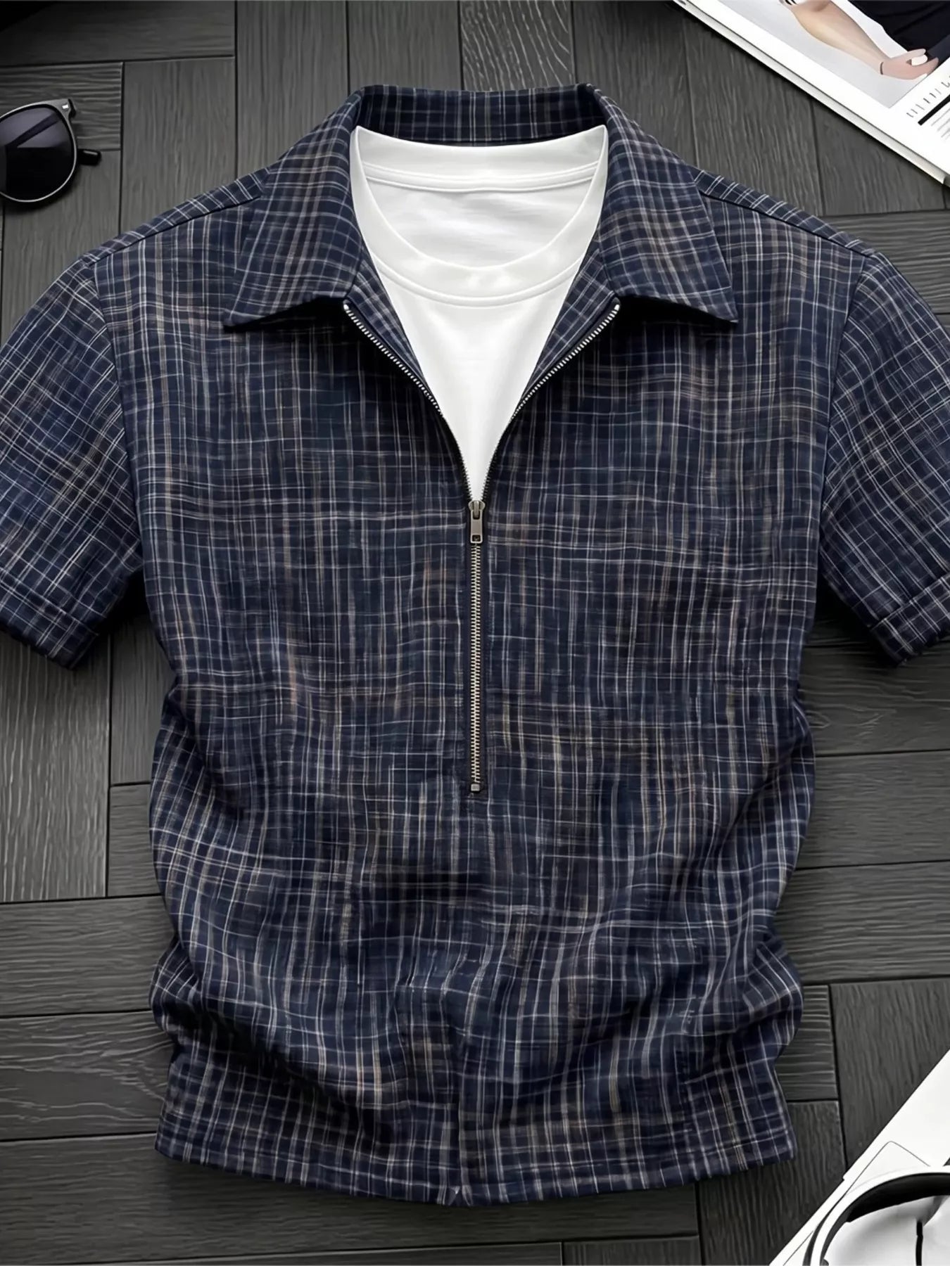 Men's navy blue plus size plaid zipper short sleeve shirt by Trendsi, featuring a classic checkered pattern and front zipper closure.