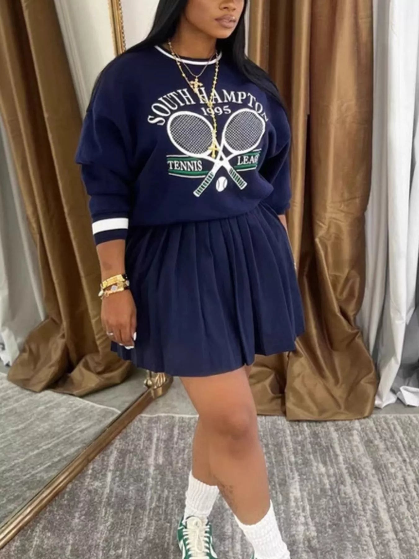 Navy blue trendy sweatshirt and skirt set for women, casual chic outfit, comfortable fabric, perfect for stylish everyday wear.