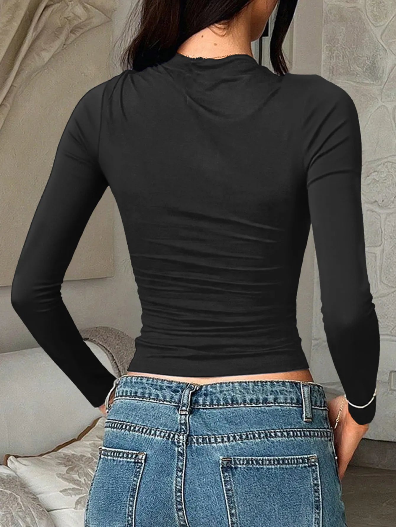 Navy blue fitted long sleeve T-shirt from Trendsi, stylish and comfortable, shown on a model with a casual fit.