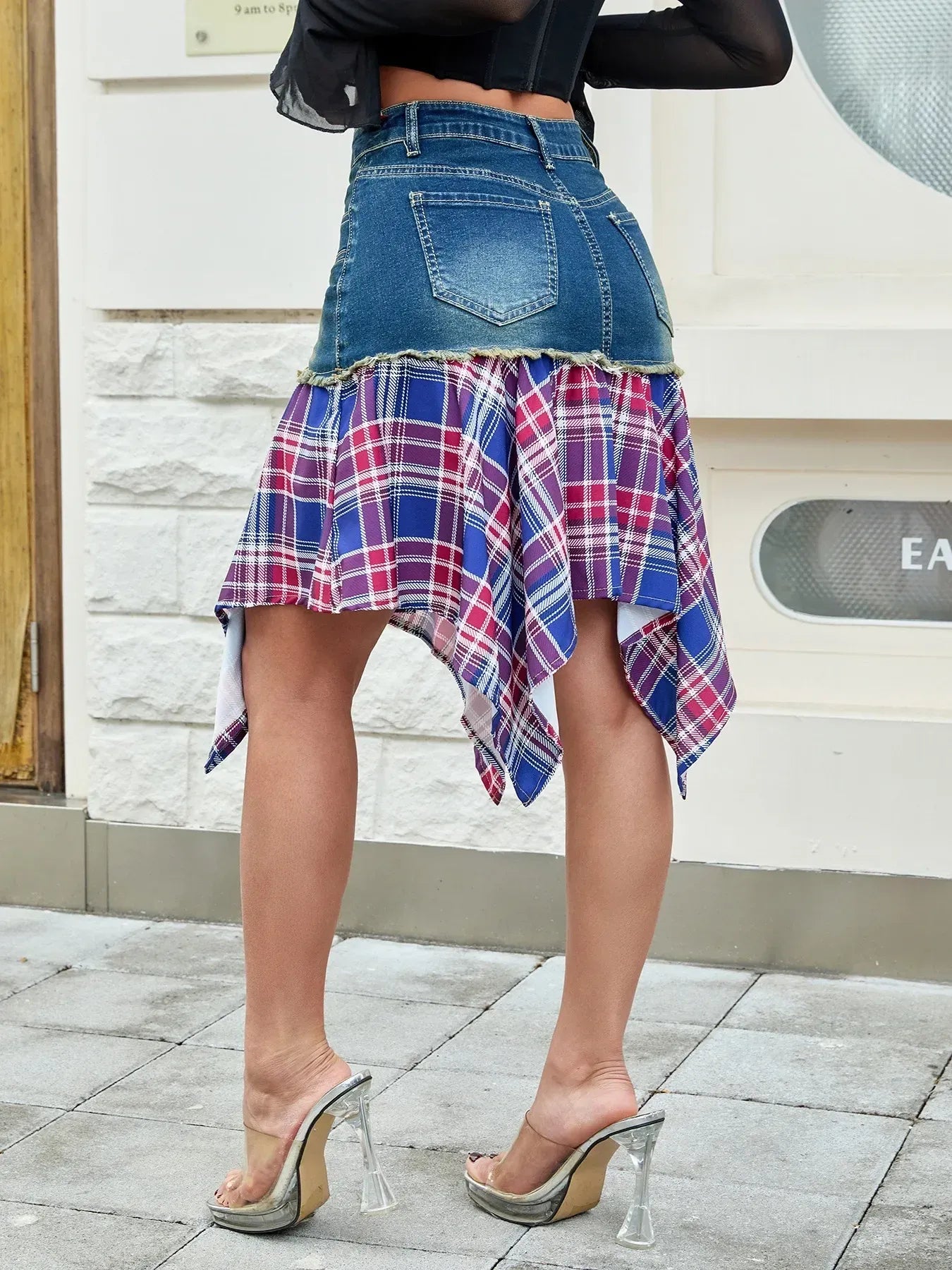 Navy blue asymmetric plaid hem denim skirt by Trendsi, front view showing stylish design and casual fit.