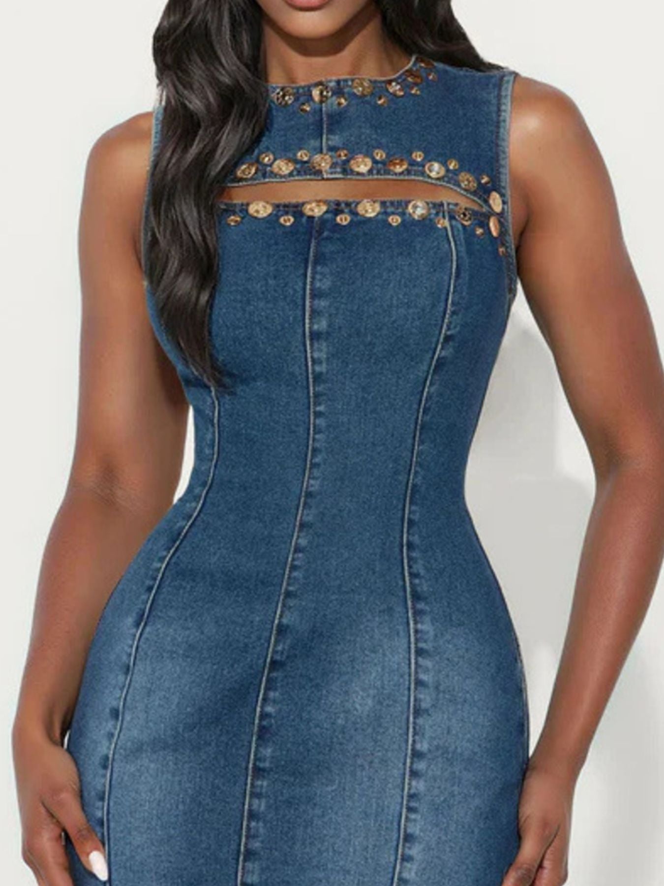 Navy embellished sleeveless cutout denim dress by Trendsi showing front view with decorative embellishments and cutout details.