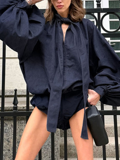 Navy tie-front denim top and shorts set by Trendsi, featuring a stylish matching casual outfit with button details and rolled hems.