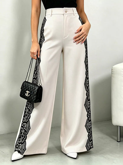 Beige lace detail wide leg pants by Trendsi, showcasing flowy fabric and elegant wide-leg design.