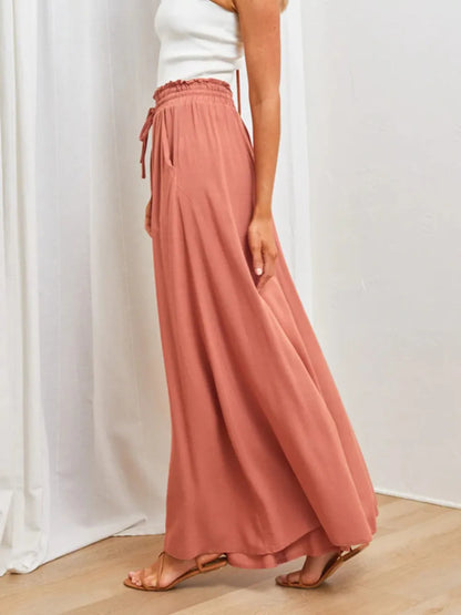 Coral high waist wide leg pants by Trendsi, showcasing a flowy fit and comfortable design with a sleek silhouette.