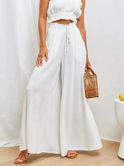 Coral high waist wide-leg pants by Trendsi, featuring a relaxed fit and flowing fabric, perfect for casual or stylish outfits.