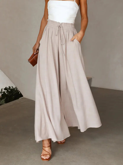 Coral high waist wide-leg pants by Trendsi, showing the flowing fabric and relaxed fit on a mannequin.