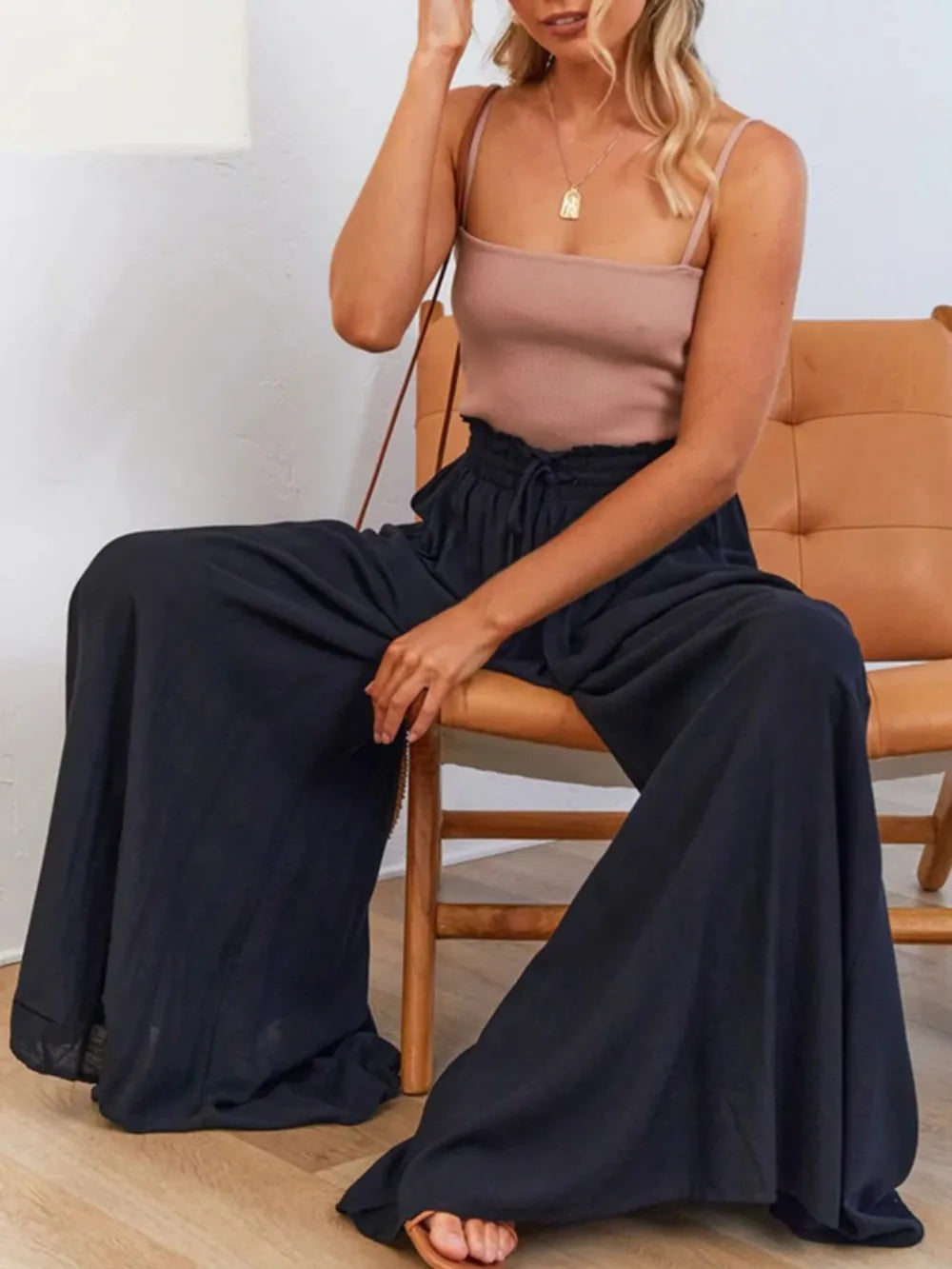 Coral high waist wide-leg pants by Trendsi, featuring a relaxed fit and flowy silhouette, styled for casual or chic looks.