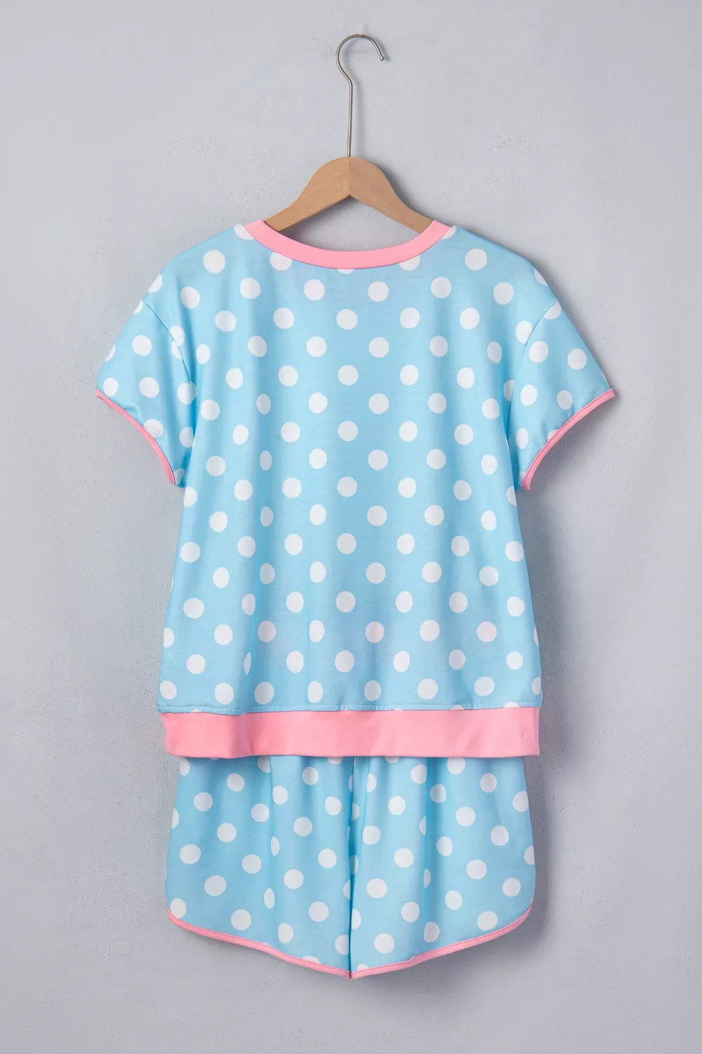 Pastel blue polka dot contrast trim top and drawstring shorts set by Trendsi, casual summer outfit with playful pattern and comfortable fit.