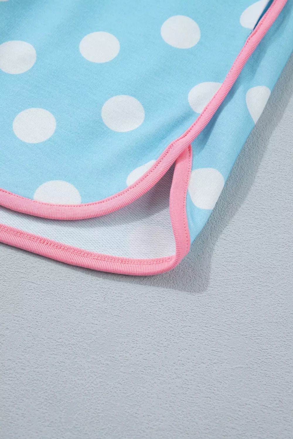 Pastel blue polka dot contrast trim top and drawstring shorts set from Trendsi, casual summer lounge outfit.