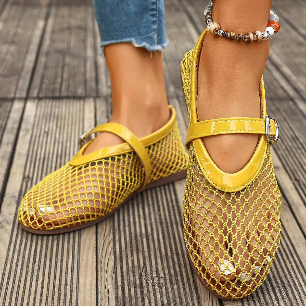 Trendsi round toe slip-on shoes featuring a sleek design and comfortable fit, shown in a close-up image.