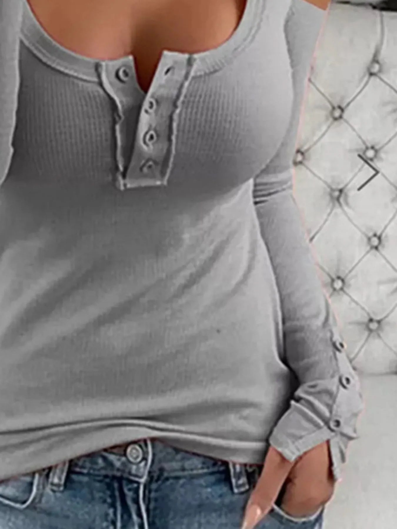 Pink cold shoulder ribbed Henley T-shirt with button detail, featuring a relaxed fit and casual style from Trendsi.