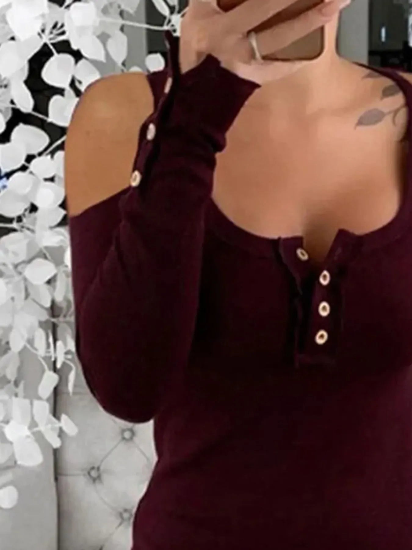 Pink cold shoulder ribbed Henley T-shirt with button detail, casual women's top by Trendsi, close-up of fabric and design.