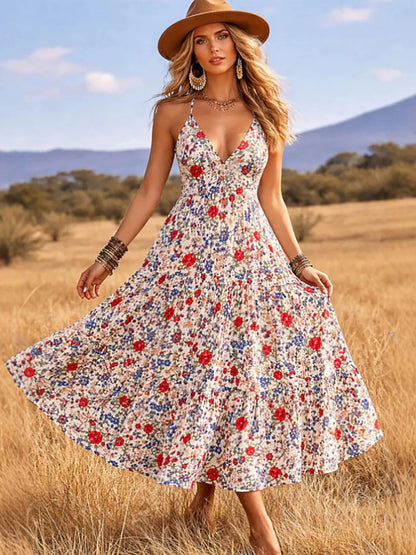 Floral print V-neck midi dress by Trendsi featuring a flowy silhouette and vibrant flower pattern.