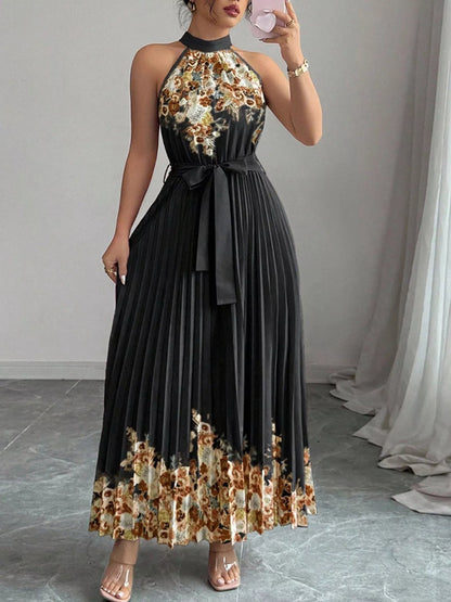 Pink floral print halter neck maxi dress with pleated design, stylish and flowy from Trendsi.