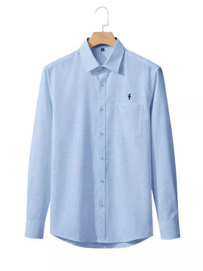 Men's full-size pink slim fit button-up shirt by Trendsi, showing a tailored fit with collar and long sleeves for plus sizes.