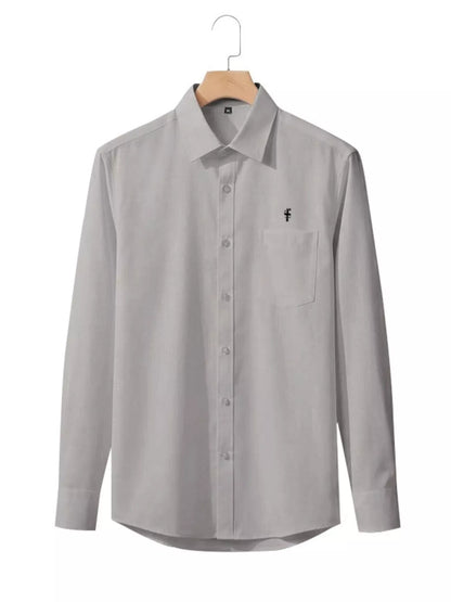 Pink men's full-size slim fit button-up shirt by Trendsi, shown in a front view, highlighting the tailored design and collar.