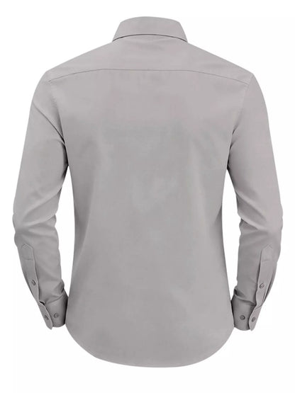 Pink men's slim fit button-up shirt in plus size from Trendsi, featuring a classic collar and long sleeves.