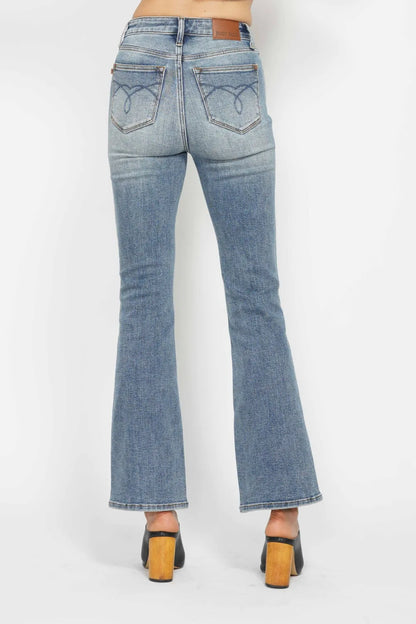 Plus size Judy Blue tummy control bootcut jeans with embroidered back pockets and classic pocket details, full length.
