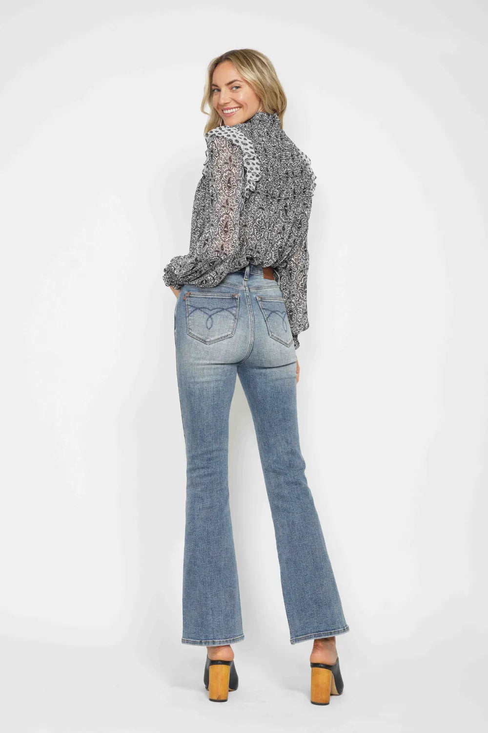 Plus size Judy Blue bootcut jeans with tummy control, embroidered back pockets, and classic pocket design.