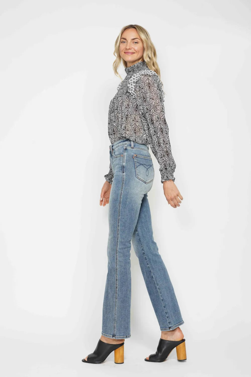 Plus size Judy Blue bootcut jeans with tummy control, embroidered back pockets, and classic fit for a comfortable, stylish look.