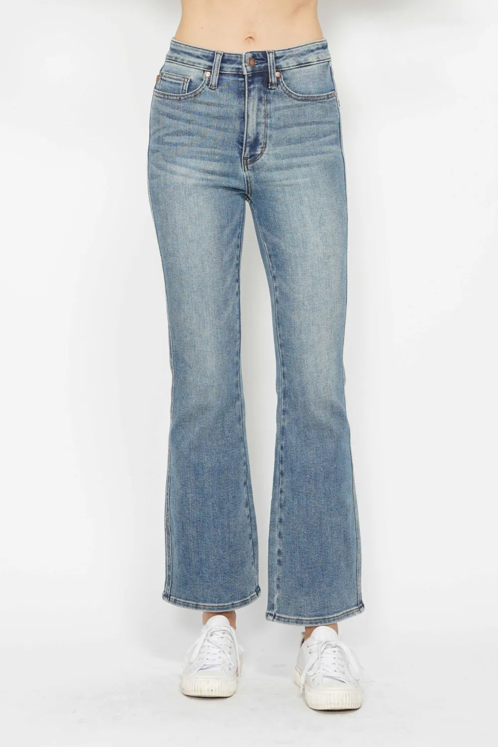 Plus size Judy Blue bootcut jeans with tummy control, embroidered back pockets, and classic fit, designed for comfort and style.
