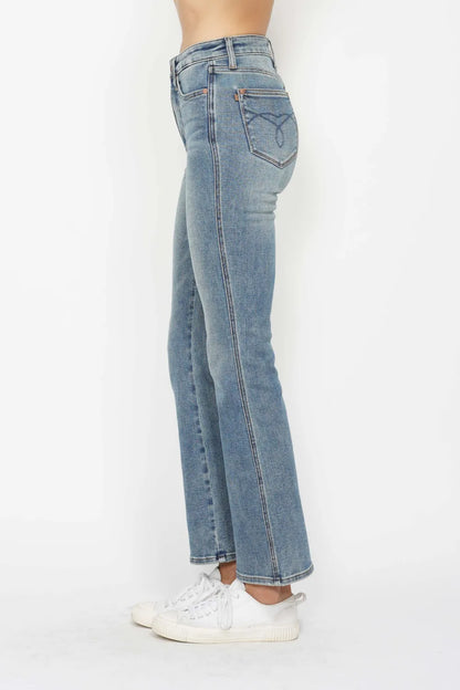 Plus size Judy Blue bootcut jeans with tummy control, embroidered pockets, and back pockets, designed for a comfortable fit.