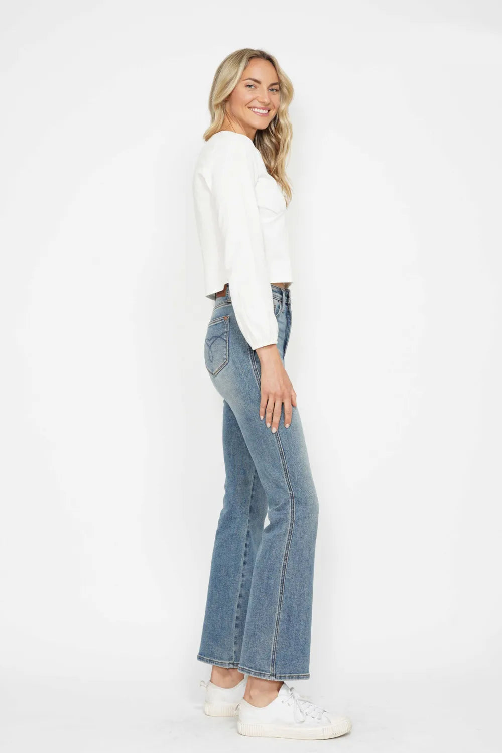 Plus size Judy Blue bootcut jeans with tummy control, embroidered back pockets, and classic pocket details, full length.