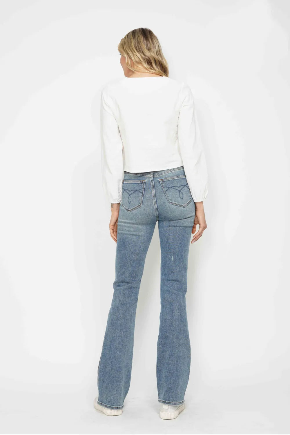 Full size Judy Blue tummy control bootcut jeans with embroidered back pockets, plus size, featuring classic denim style.