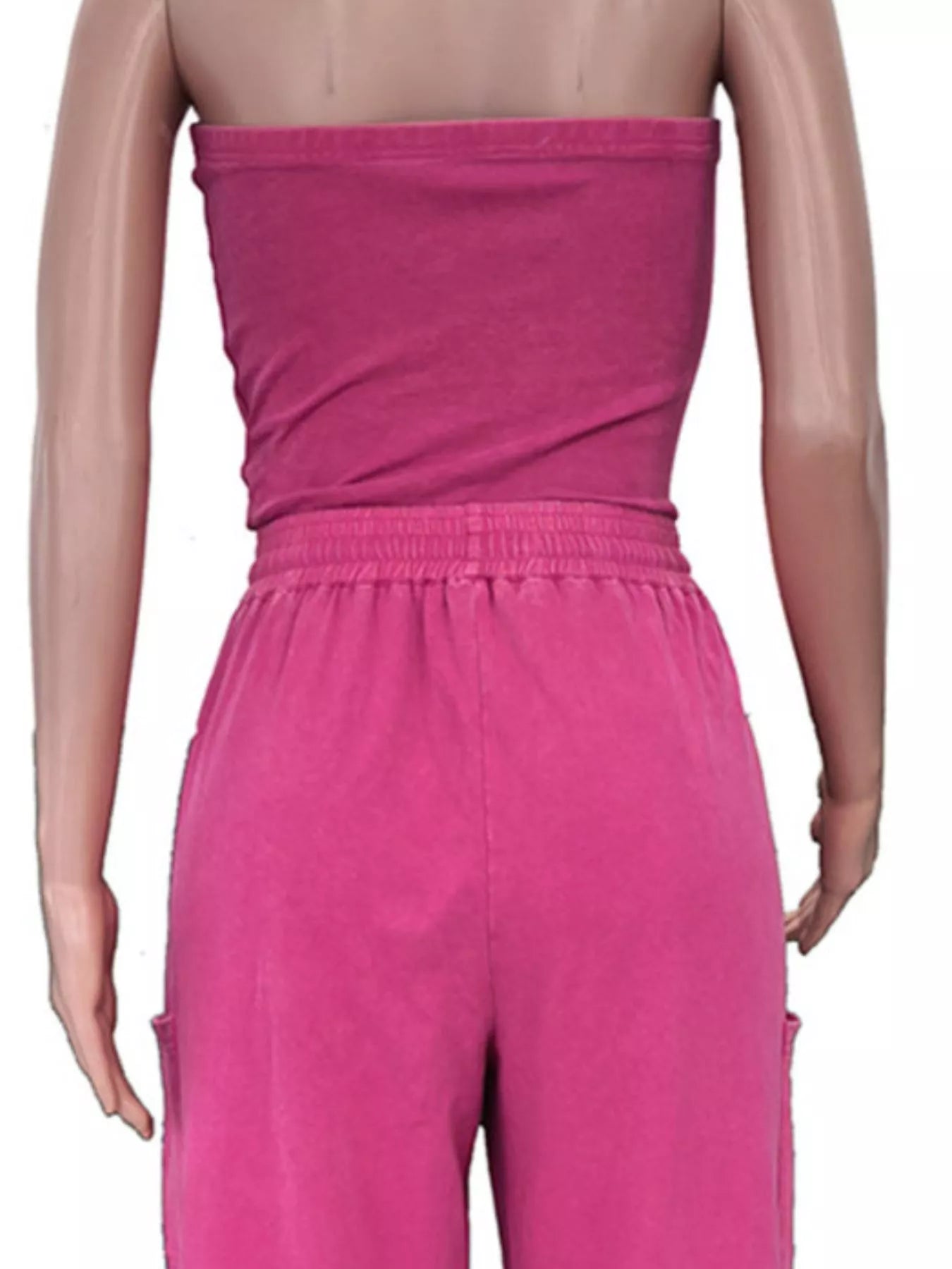 Rose-red drawstring strapless wide-leg jumpsuit from Trendsi, featuring a relaxed fit and stylish design.