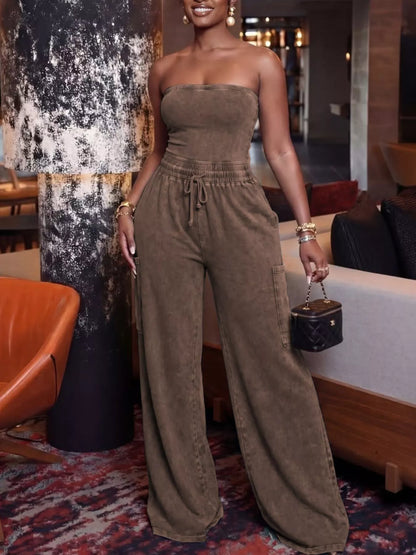 Rose-red drawstring strapless wide-leg jumpsuit by Trendsi, featuring a relaxed fit and flowing fabric.