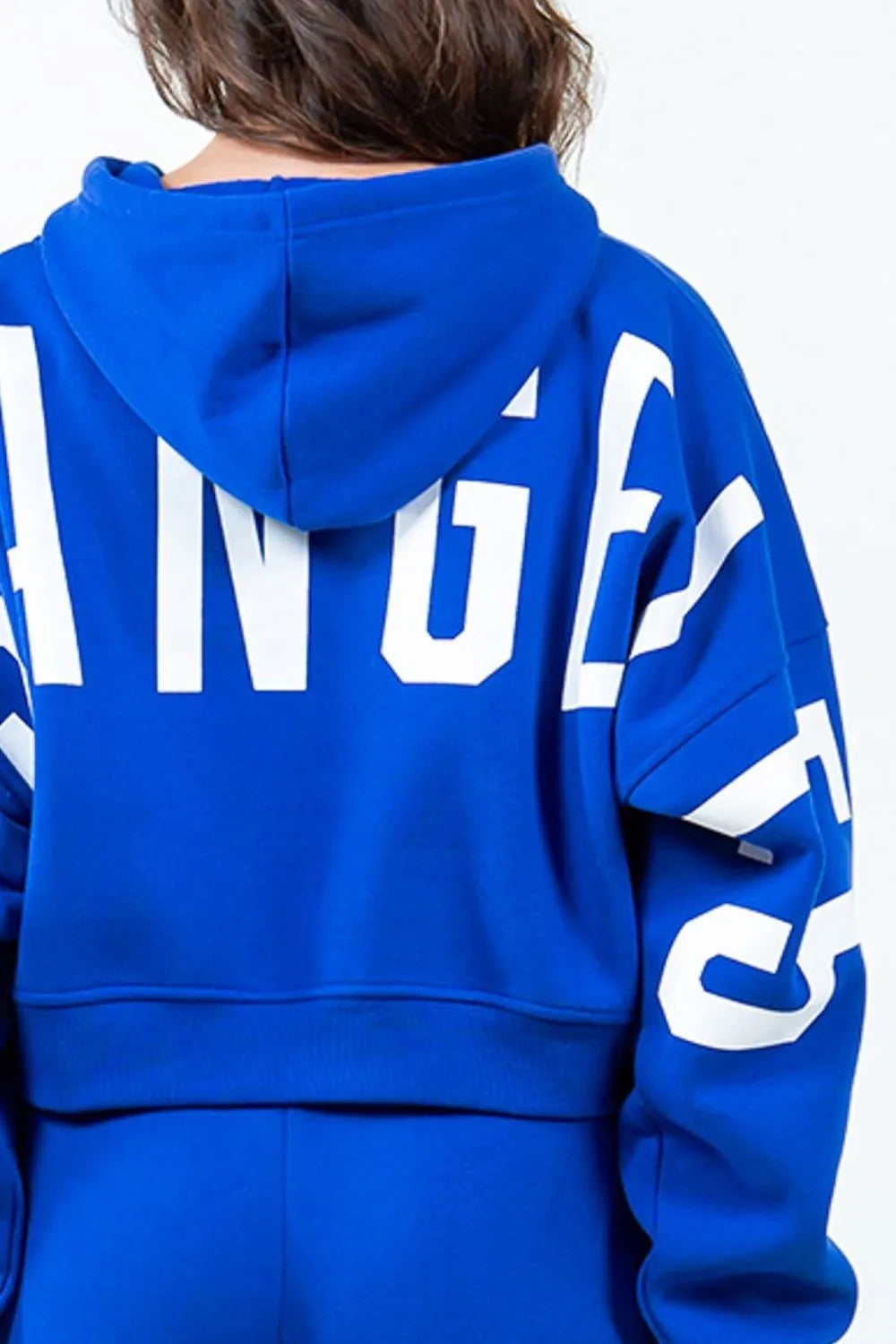 Royal blue cropped hoodie with stylish letter graphic from Trendsi, perfect for casual chic and effortless everyday wear.