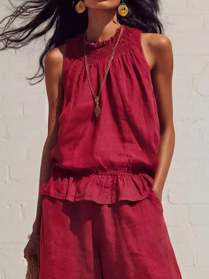Smocked ruffled hem top and wide-leg pants set by Trendsi, featuring a stylish, coordinated summer outfit with feminine details.