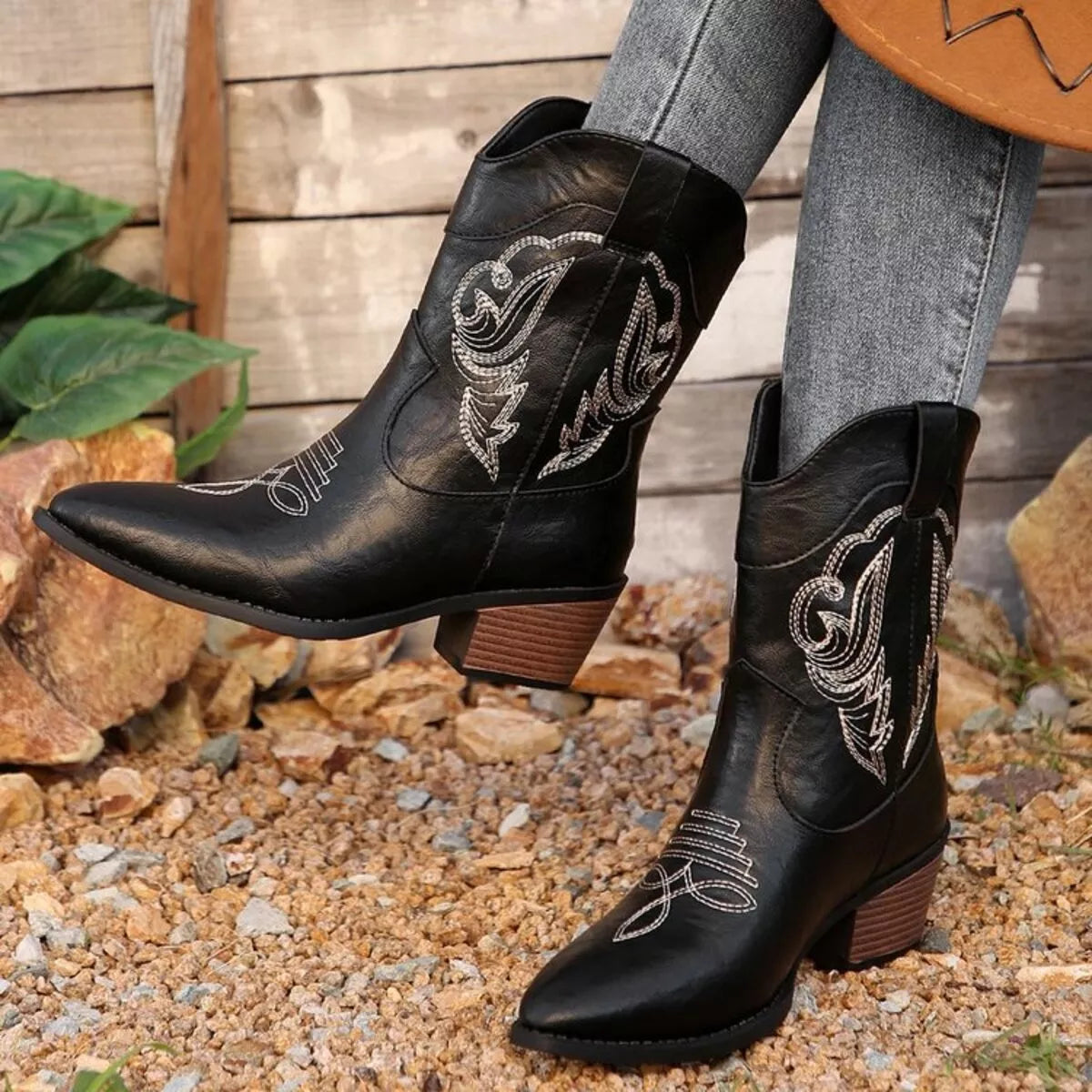 Black Western cowboy boots with embroidered design from Trendsi, showcasing traditional Western shoe style and intricate embroidery.