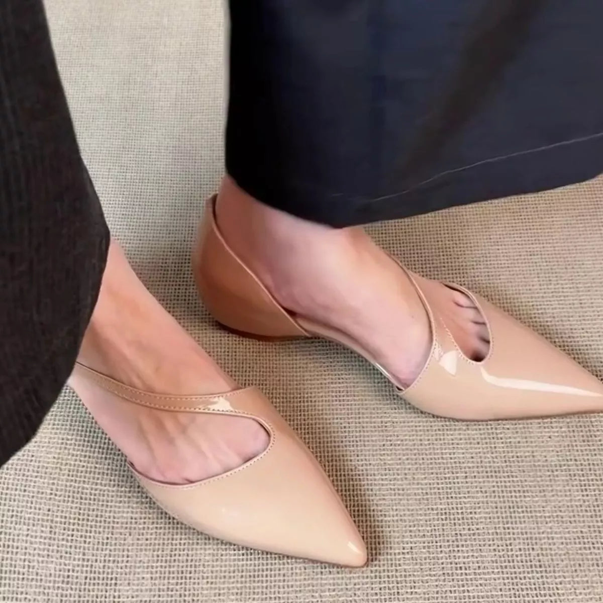 Pink point toe flats from Trendsi, stylish shoes with a sleek design, perfect for casual or dressy outfits.
