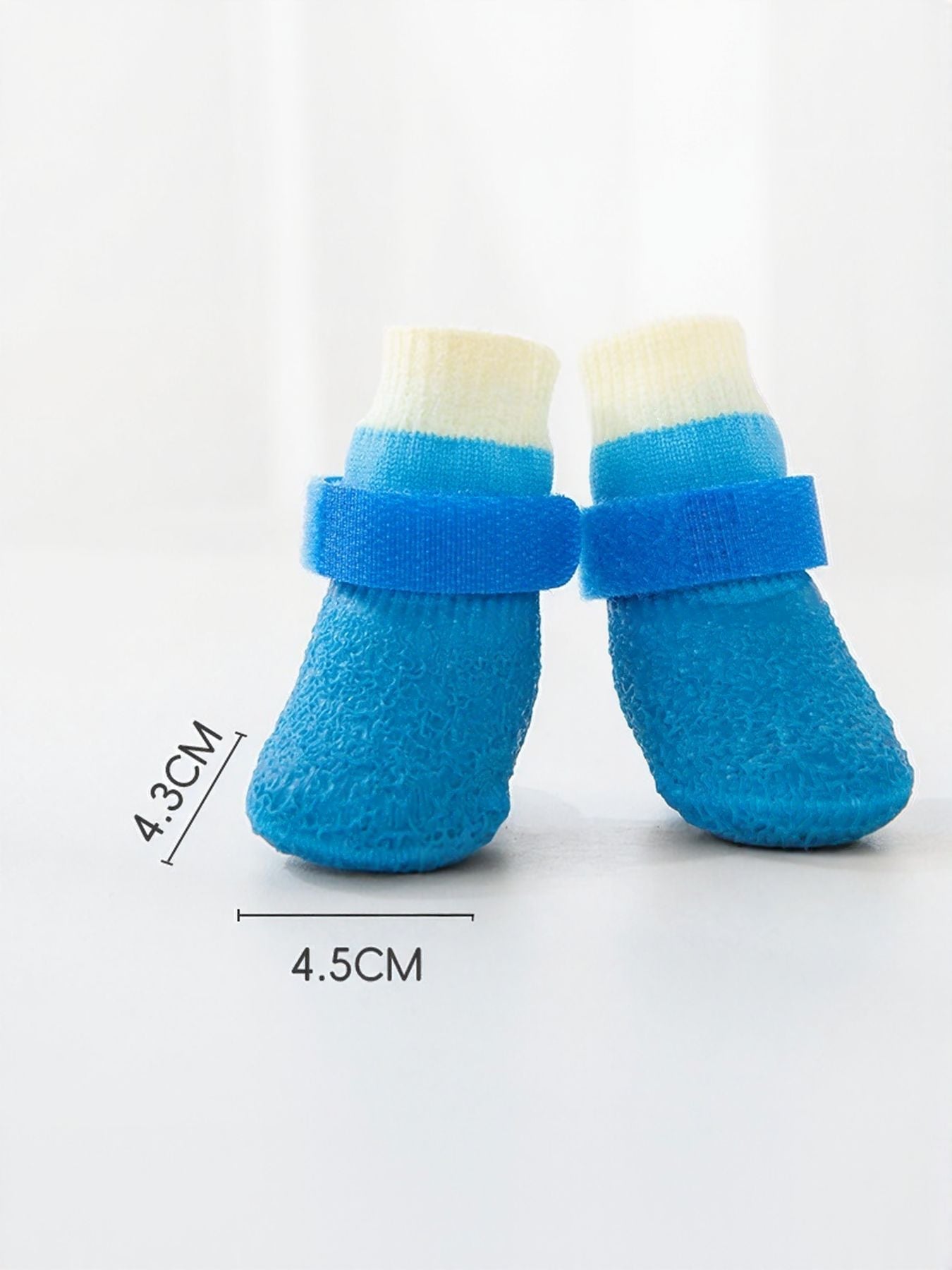 Sky blue waterproof anti-slip pet shoes by Trendsi, designed to protect paws and prevent slipping during outdoor walks.