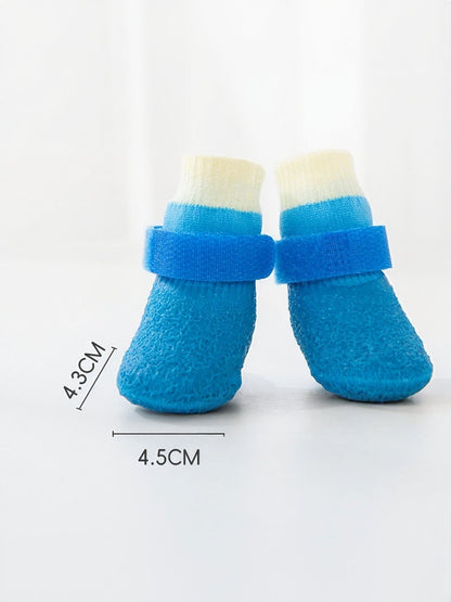 Sky blue waterproof anti-slip pet shoes by Trendsi, designed to protect paws and prevent slipping during outdoor walks.