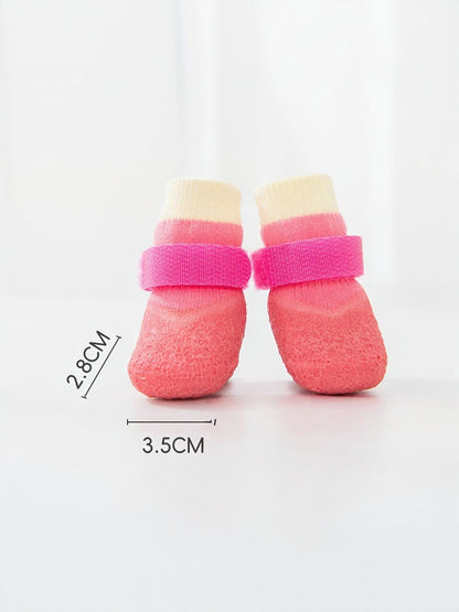 Waterproof anti-slip pet shoes by Trendsi, showing durable soles and snug fit for small dogs and cats.