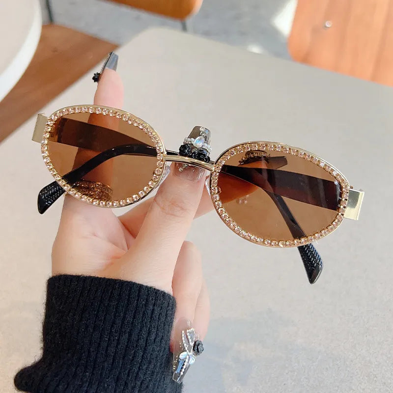Trendsi rhinestones decor oval sunglasses with sparkling rhinestone embellishments on the frames.