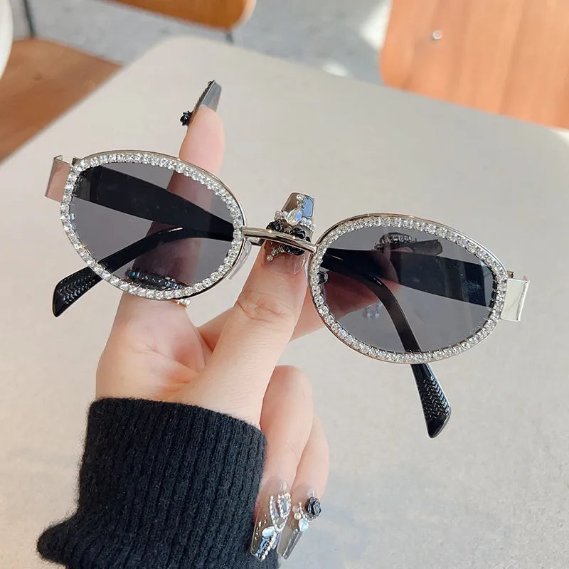 Trendsi rhinestones decor oval sunglasses with sparkling rhinestone accents and sleek black frames.