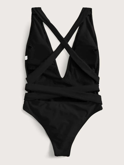 Hot pink halter neck deep V tied one-piece swimsuit from Trendsi, featuring stylish swimwear design with adjustable straps.